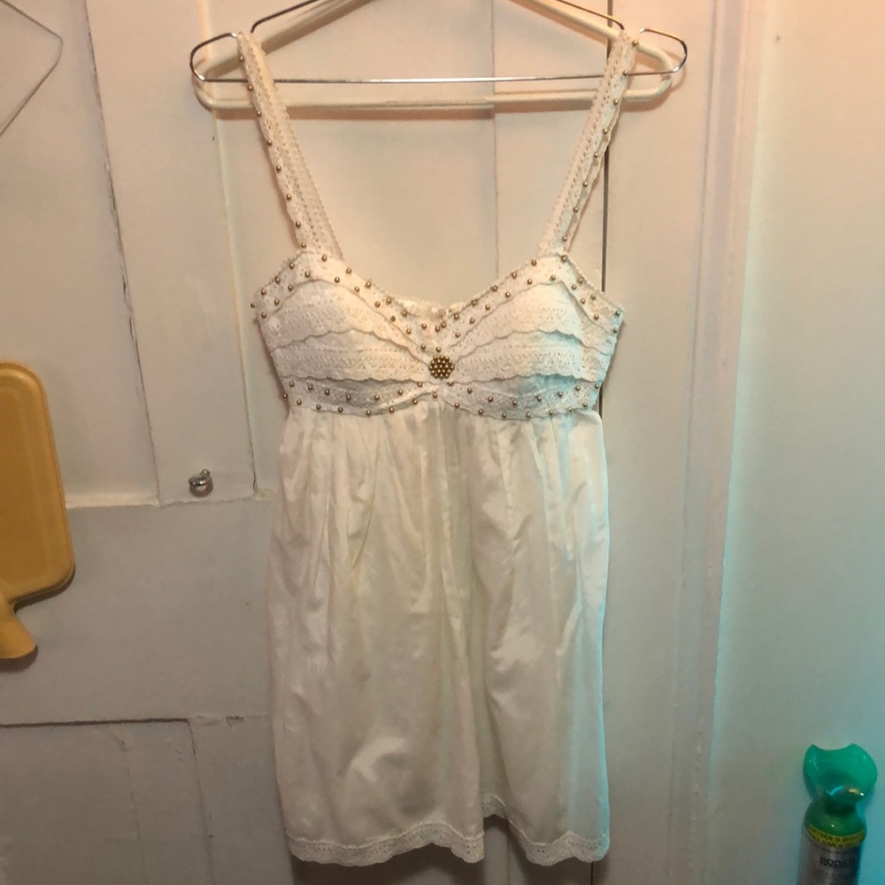 Bebe white top with beaded details all around